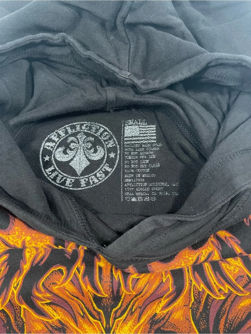True Religion Black Hoodie with Fiery Orange Skull Graphic